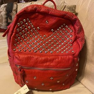 Stylish red backpack with silver studded designs by Collection Eighteen